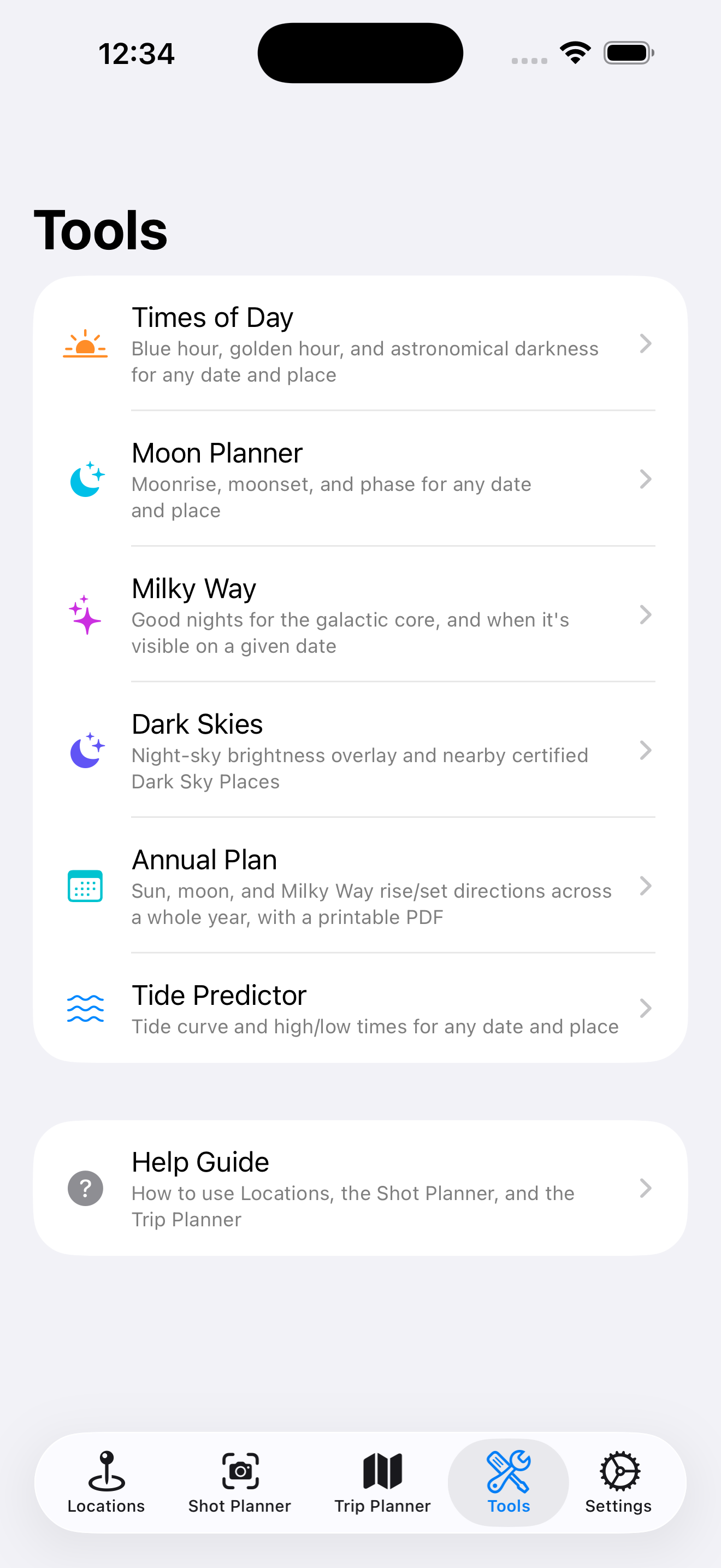Tools screen listing Times of Day, Moon Planner, Milky Way, Dark Skies, Annual Plan, and Tide Predictor